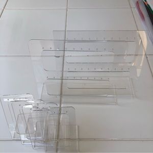 Six acrylic earring stands, 4 small and 2 large